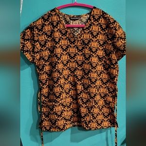 Cassandra O halloween scrub top.